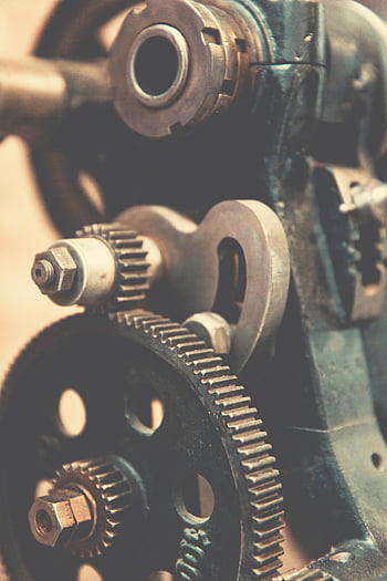 vintage industrial machinery, green and black metal, precision engineering, detailed view, gears, metal machine, industrial gears, vintage machinery, engineering details, metal components, industrial components