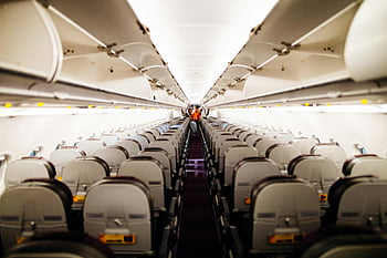 empty airplane interior, aisle seats, overhead bins, airplane cabin, airplane seats, airplane aisle, airplane overhead compartments, airplane interior view, airplane cabin view, airplane seating arrangement, airplane interior design