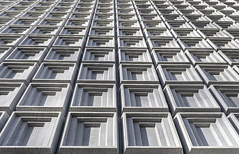 concrete building, architectural details, modern building facade, geometric patterns, repetitive design, low angle shot, Chur architecture, urban design, contemporary architecture, structural design, building exterior