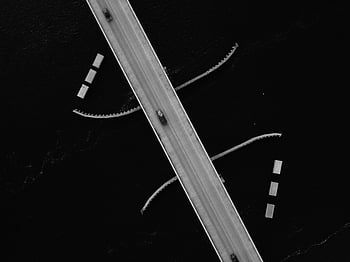 aerial view, cars on road, black and white, bridge over water, transport infrastructure, aerial photography, road infrastructure, bridge structure, waterway crossing, transportation network, urban planning