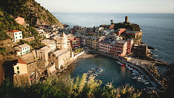 aerial view, city buildings, ocean, Vernazza, colorful coastal village, Cinque Terre, Italy, seaside, historic architecture, harbor, boats