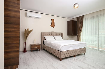 modern bedroom, minimalist design, luxury amenities, bright bedroom, airy bedroom, Istanbul bedroom, wooden furniture, white bedding, contemporary bedroom, simple bedroom, luxury bedroom