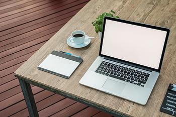 Macbook Pro, minimalist outdoor workstation, laptop, coffee, tablet, rustic table, outdoor setup, workspace, digital nomad, productivity, minimalist desk