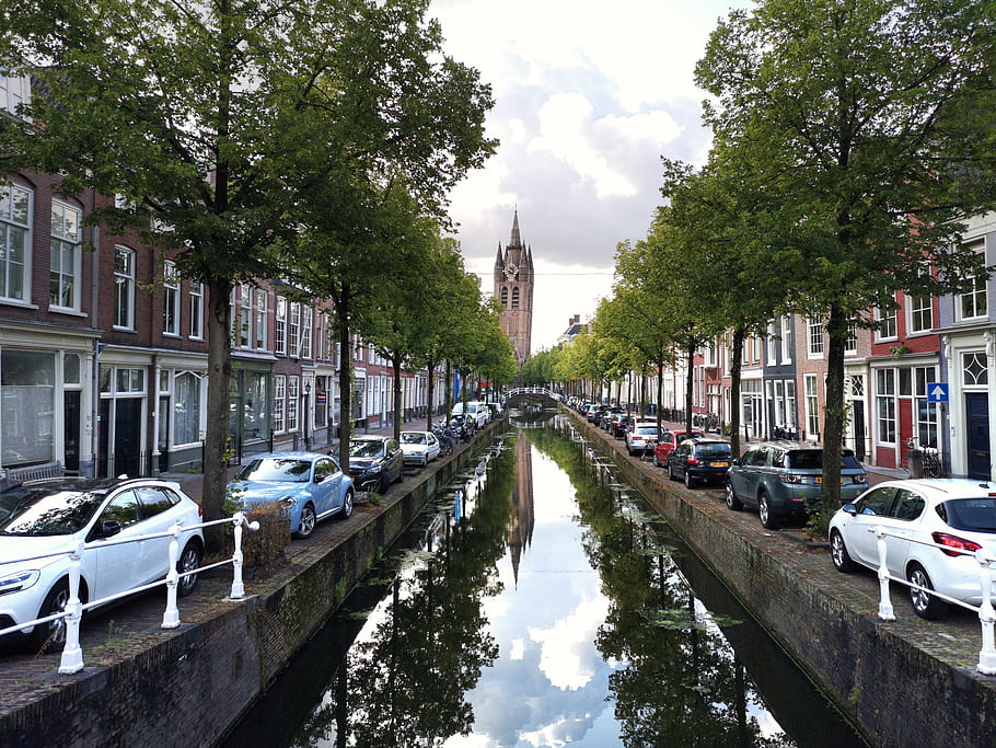 Delft, Netherlands, canal, cars, trees, buildings, reflection, church, tower, cloudy, sky