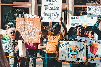 street protest, political change, diverse participants, creative signs, coffee shop, rally, political rally, street demonstration, protest signs, political advocacy, public demonstration
