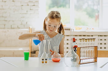 girl, flask, colored liquid, science experiment, classroom, bright setting, flasks, science activity, educational activity, young scientist, laboratory equipment