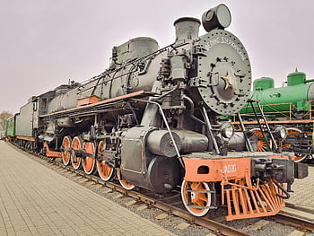 vintage steam locomotive, black and red train, railway tracks, outdoor train, close-up train, steam engine, train wheels, railway museum, locomotive details, train exterior, train history