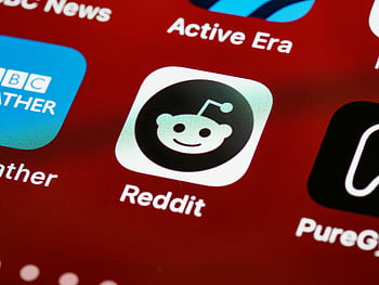 Reddit app icon, smartphone screen, popular applications, red white black, labeled box, app icons, detailed view, Reddit logo, mobile apps, app interface, digital display