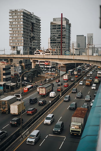 verkeer in het centrum, Jakarta snelweg, stedelijke wolkenkrabbers, bruisend verkeer, viaduct, stadsgezicht, drukke weg, centrum van Jakarta, stedelijk verkeer, stadsverkeer, snelwegverkeer