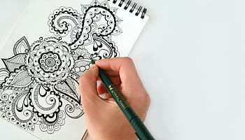 mandala pattern, sketching, black pen, hand drawing, sketchbook, creativity themes, intricate design, close-up, art, drawing, pen art