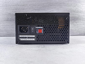 computer power supply unit, back panel, power socket, switch, ventilation grill, detailed view, smart fan control, input voltage, close-up, PSU, computer hardware