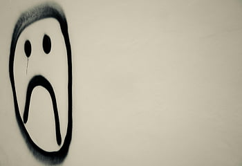 sad face graffiti, monochrome photo, urban emotion, white and black wall, wall paint, black and white, graffiti art, urban art, emotional art, street art, sad face