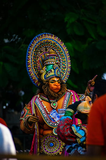 colorful costume, Hindu deity, outdoor festival, parade, traditional attire, cultural event, festive display, vibrant outfit, ceremonial dress, cultural parade, festival celebration