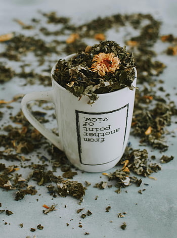 white and brown ceramic mug, herbal tea mug, dried leaves, dried flowers, close-up, table, ceramic mug, herbal tea, dried herbs, tea mug, white mug