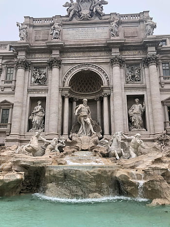 fontana di Trevi, Roma, iconico, Sculture intricate, acqua corrente, struttura in cemento, gruppo di persone statue, punto di riferimento storico, architettura italiana, destinazione del viaggio, Arte barocca