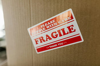 brown cardboard, fragile sticker, close-up, cardboard box, handle with care, shipping label, packaging, delivery, caution, fragile package, thank you