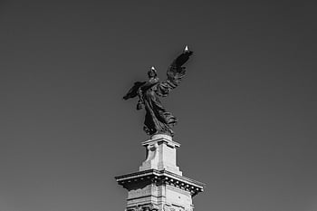 black stone statue, angel, pedestal, monochrome image, angelic statue, clear sky, sculpture, outdoor art, historical monument, black and white photography, architectural detail