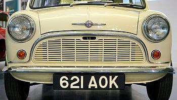 yellow classic car, vintage car, 621 AOK, distinctive headlights, number plate, close-up, front view, retro vehicle, classic automobile, vintage automobile, car license plate