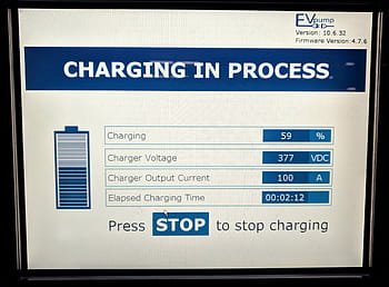 charging in process, EV pump, battery level, charger voltage, charger output current, elapsed charging time, stop button, firmware version, display screen, electric vehicle, charging station