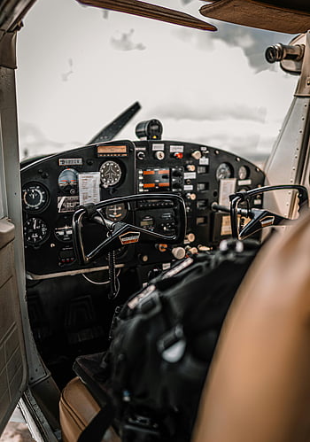 light aircraft, cabin, control panel, classic aircraft, cockpit, flight instruments, controls, detailed view, aircraft interior, pilot seat, dashboard