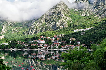 Kotor Bay village, mountains, reflecting waters, beautiful landscape, town beside mountain, near lake, scenic view, Montenegro, coastal town, natural beauty, serene setting