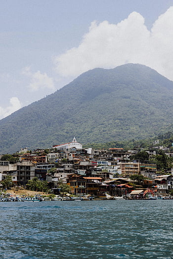 San Pedro La Laguna, lake view, volcanic backdrop, small town, scenic landscape, mountains, waterfront, Guatemala, Central America, travel destination, natural beauty