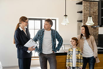 real estate agent, family, child, modern kitchen, home showing, man talking, agent, real estate, home tour, property viewing, family home