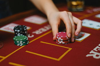 casino-poker-chips-gambling-casino-table-cards-poker-gambling-activity-casino-game-casino-chips-poker-table-thumbnail.jpg