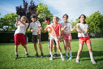 children dancing, park, happy kids, outdoor fun, green park, sunny day, group of kids, playing, summer activities, children's activities, outdoor play