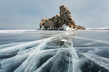 Shaman Rock, Frozen Lake Baikal, winter landscape, ice formations, rocky islet, Irkutsk Russia, Baikal Russia, frozen lake, winter scenery, natural wonder, ice patterns