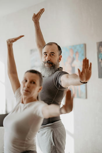 elderly man, elderly woman, yoga, senior couple, indoor exercise, healthy lifestyle, well-being, yoga exercises, indoor yoga, active seniors, fitness