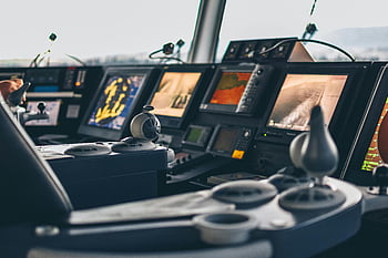 cockpit, nautical cockpit, advanced navigation systems, high-tech controls, ship controls, marine navigation, boat cockpit, maritime technology, vessel control, navigation equipment, dashboard controls