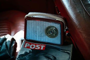 retro radio, leather car seat, Picture Post magazine, vintage nostalgia, classic radio, vintage magazine, car interior, old-fashioned radio, vintage car seat, classic magazine, retro nostalgia
