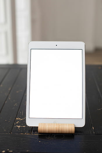 tablet, blank screen, bamboo stand, vertical mockup, rustic wooden table, app design, website presentation, digital display, tablet stand, blank tablet, wooden table
