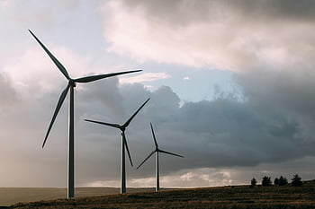 wind turbines, renewable energy, dramatic sky, cloudy sky, gray wind turbines, wind power, sustainable energy, wind farm, energy generation, environmental technology, green energy
