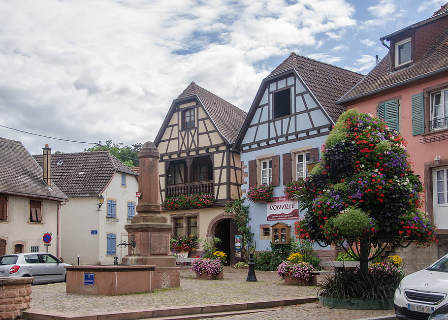 Ottrott, Alsace, half-timbered houses, fountain, flowers, village, cloudy, blue, timber-frame, Fachwerkhaus, flower