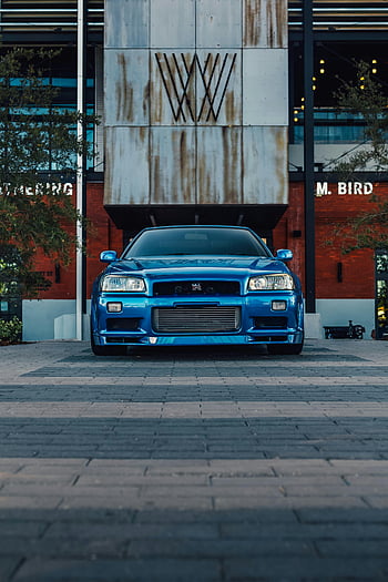 Nissan GT-R Skyline R34, blue Nissan GT-R, Tampa Florida, rare car, front view, outdoor parking, iconic car, Nissan GT-R, Skyline R34, blue car, Tampa car
