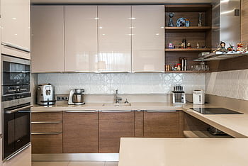 modern kitchen, contemporary cabinets, high-end appliances, sleek design, kitchen appliances, wooden cabinets, white backsplash, open shelving, kitchen decor, minimalist kitchen, kitchen island