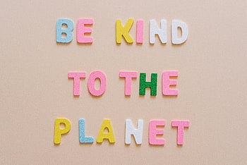 colorful text, Be Kind to the Planet, beige background, environmental quote, colorful letters, eco-friendly message, pastel colors, motivational quote, sustainable living, earth care, planet conservation
