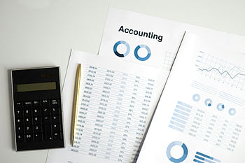 accounting documents, calculator, charts, workspace, financial reports, pen, data analysis, business analytics, office supplies, financial charts, accounting charts