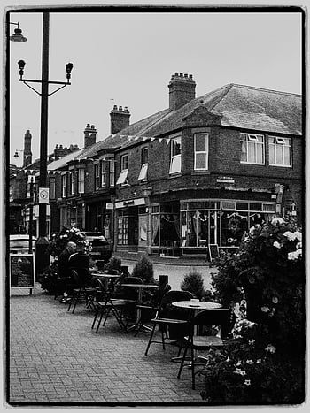 cafe, street, town, black and white, outdoor cafe, charming town, classic image, street scene, town street, outdoor seating, black-and-white photography