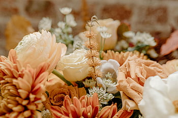 romantic event flowers, fresh flower bouquet, warm hues flowers, charming bouquet, assorted flowers, perfect for ceremonies, romantic flowers, warm tone flowers, floral arrangement, romantic bouquet, ceremony flowers