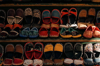 handmade shoes, colorful slippers, kids shoes, market stall, handmade slippers, colorful shoes, kids slippers, display, market shoes, handmade footwear, kids footwear