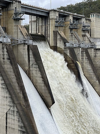 industrial dam, river, powerful water cascade, large concrete dam, hydroelectric power, water flow, dam structure, energy production, water management, environmental engineering, infrastructure