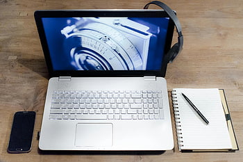 white black laptop, modern workspace, wooden desk, smartphone, headphones, notebook, top view, laptop computer, workspace setup, office desk, productivity tools