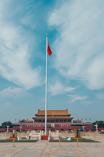 Tiananmen Square, Beijing, China, Chinese flag, clear blue sky, iconic view, Tiananmen Gate, national landmark, urban landscape, travel destination, cultural site