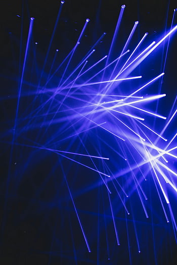 blue laser lights, dynamic lighting, dark room, vibrant visual effect, modern visual, indoor setting, light rays, blue light, laser show, dark indoor, visual art