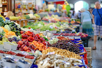 vegetables stall, fresh fruits, outdoor market, colorful assortment, bustling scene, fresh vegetables, market scene, outdoor market scene, fresh produce, market stall, fruits and vegetables