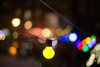 defocused image, illuminated lights, night, vibrant bokeh, colorful string lights, festive theme, party theme, bokeh effect, night lights, colorful bokeh, string lights