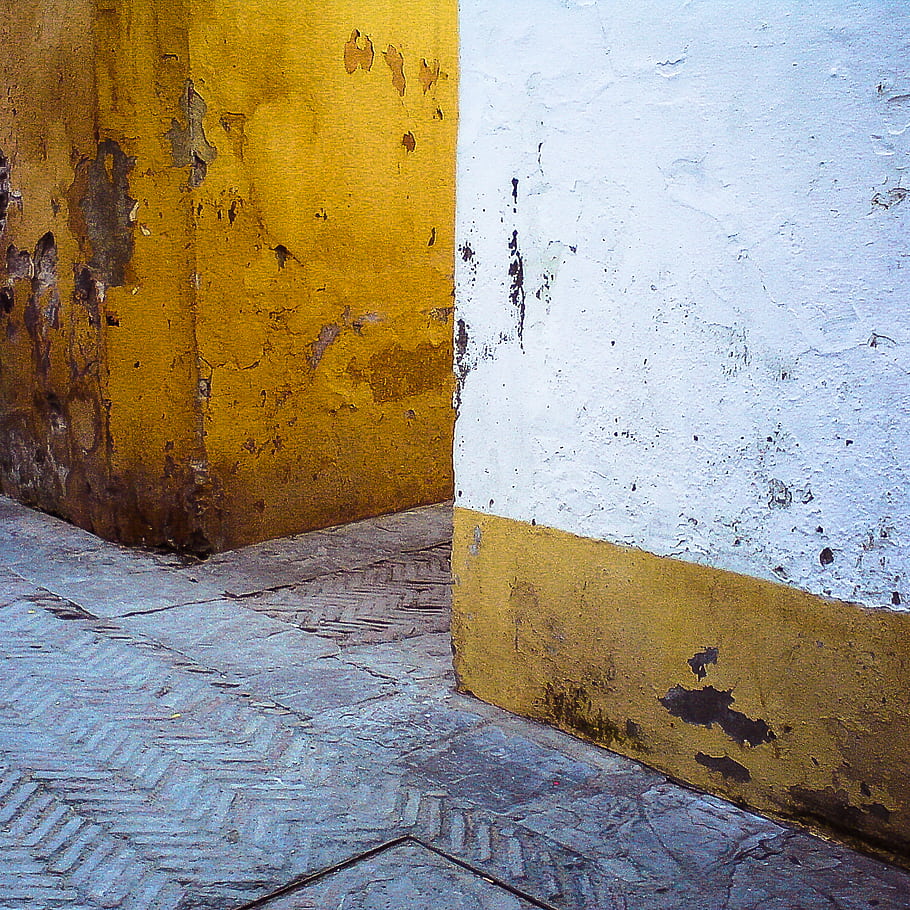 Jewish quarter, yellow wall, white wall, peeling paint, stone pavement, corner, texture, urban, street, architecture, history